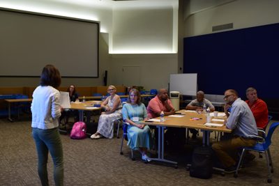 Teacher Innovator Award winners listening to a lecture