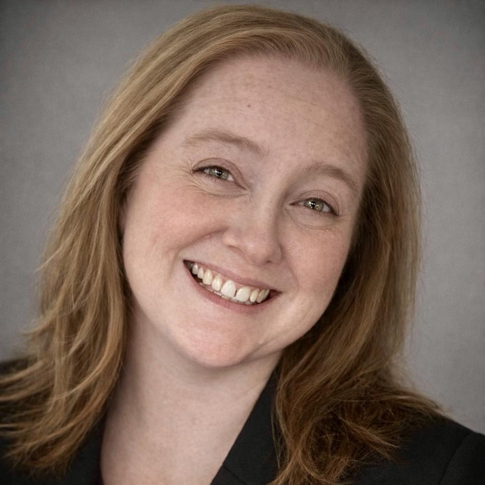 A woman smiling